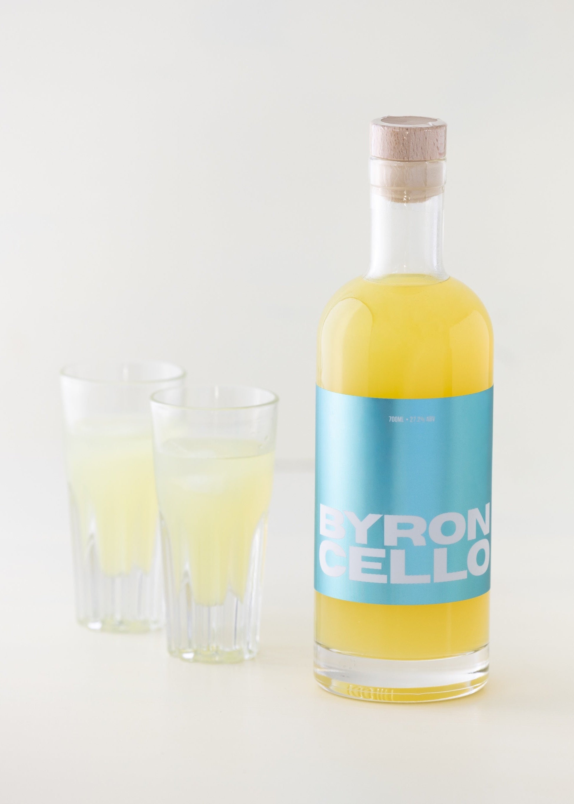 Bottle of Byroncello with two Italian limoncello glasses