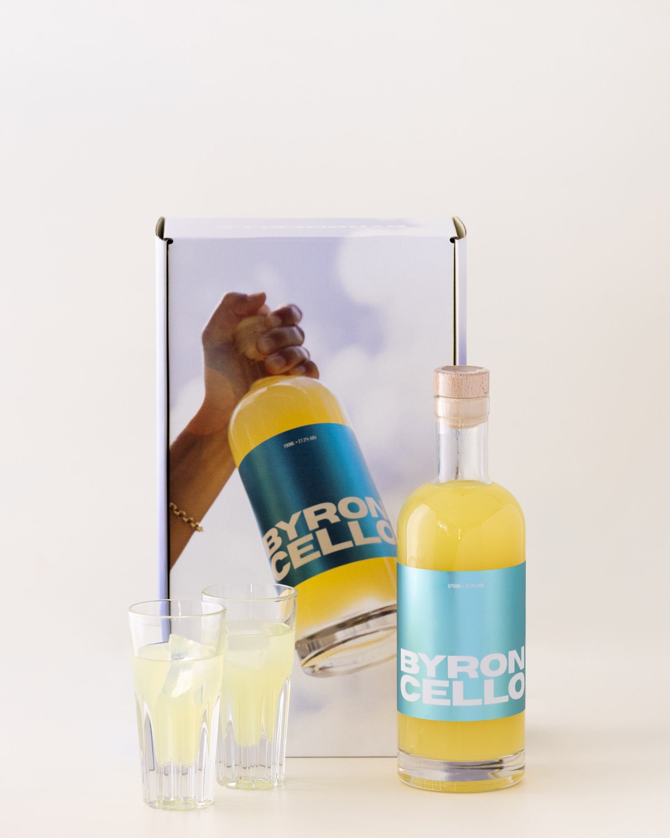Bottle of Byroncello with a gift box and two Italian limoncello glasses