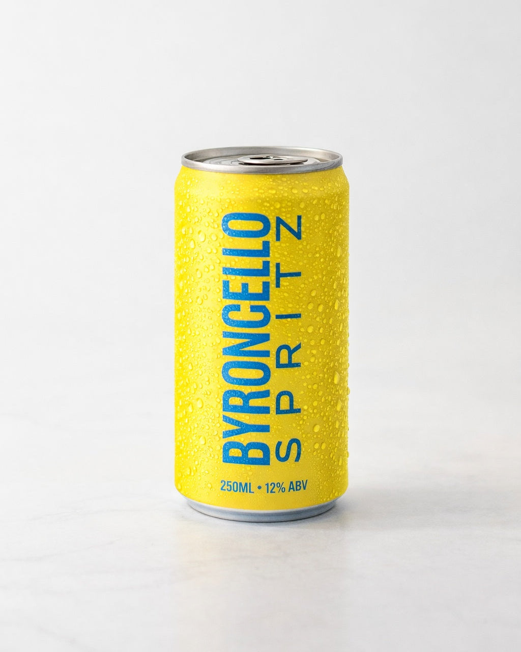 Yellow can of Byroncello Spritz on a white background